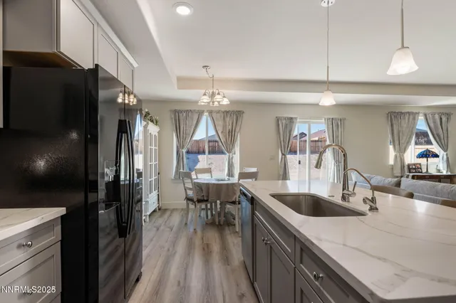 a kitchen with counter top space cabinets and stainless steel appliances