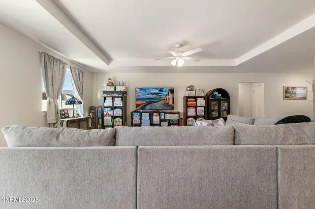 a living room with furniture and a couch