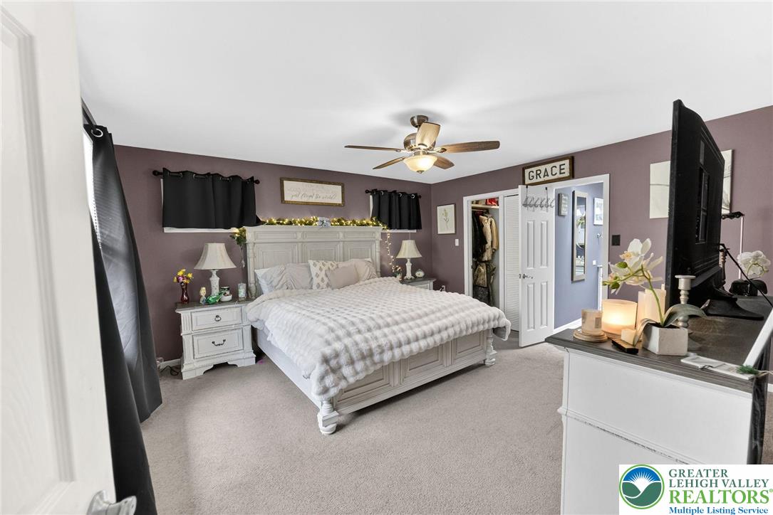 311 Lynoak Avenue Shillington, PA 19607 - Photo 15 of 40 a bedroom with a bed and a flat screen tv