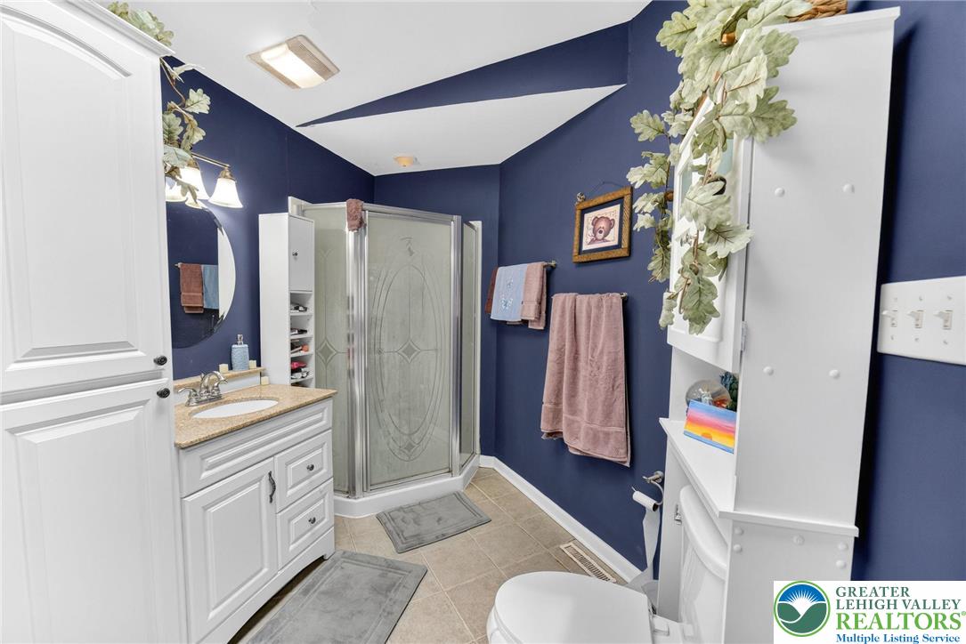 311 Lynoak Avenue Shillington, PA 19607 - Photo 18 of 40 a bathroom with a sink toilet and shower