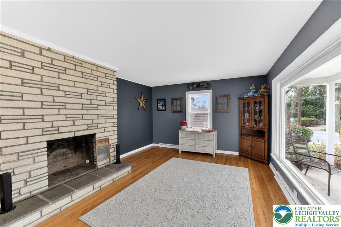 311 Lynoak Avenue Shillington, PA 19607 - Photo 7 of 40 a bedroom with a bed and a fireplace