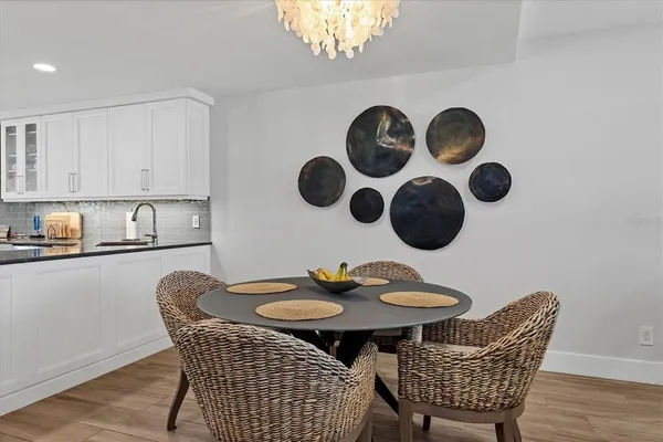 a table and chairs in a kitchen