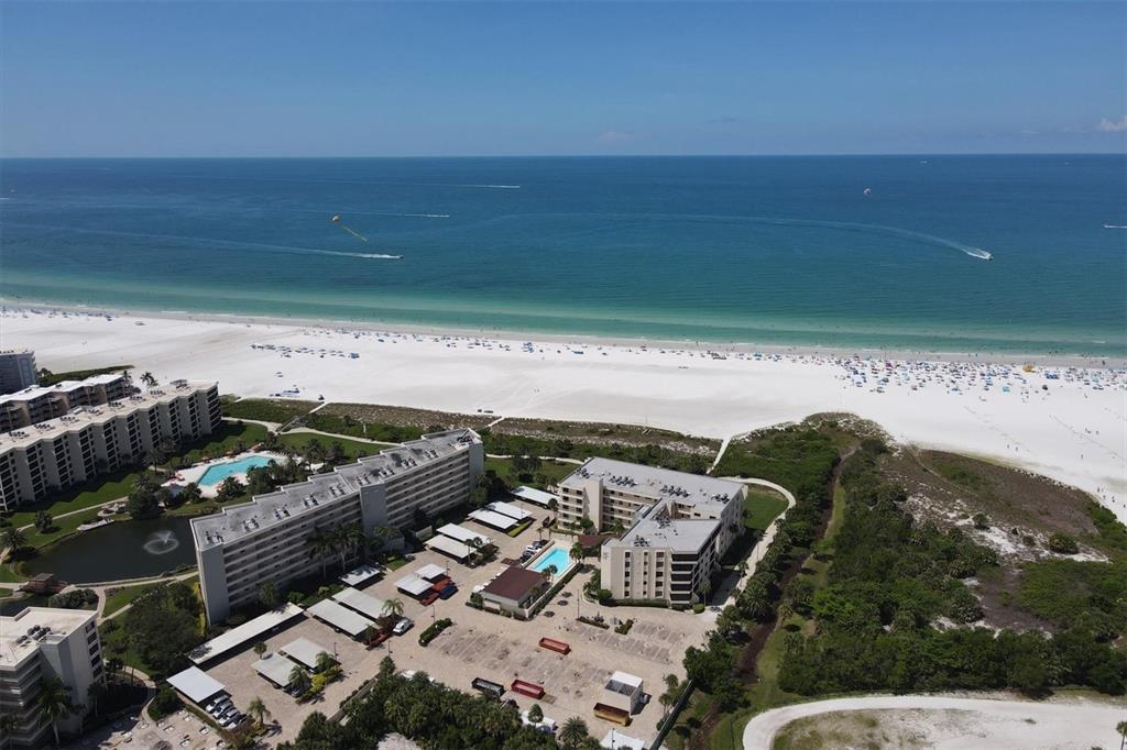 5740 Midnight Pass Road, Unit 303F Sarasota, FL 34242 - Photo 2 of 51 a view of outdoor space with seating area