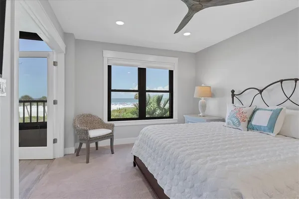 a bedroom with bed and a window