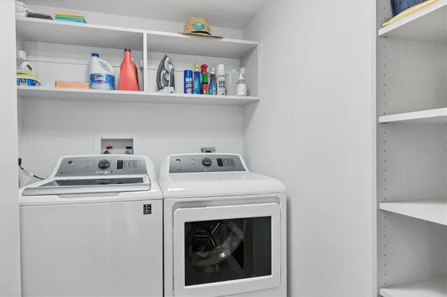 a utility room with dryer and washer