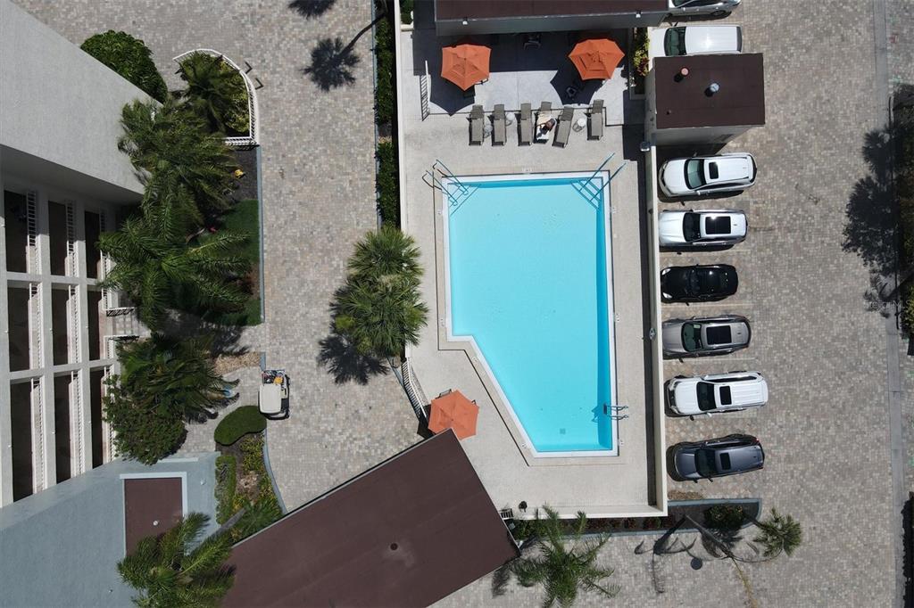 5740 Midnight Pass Road, Unit 303F Sarasota, FL 34242 - Photo 38 of 51 an aerial view of a house with street sign