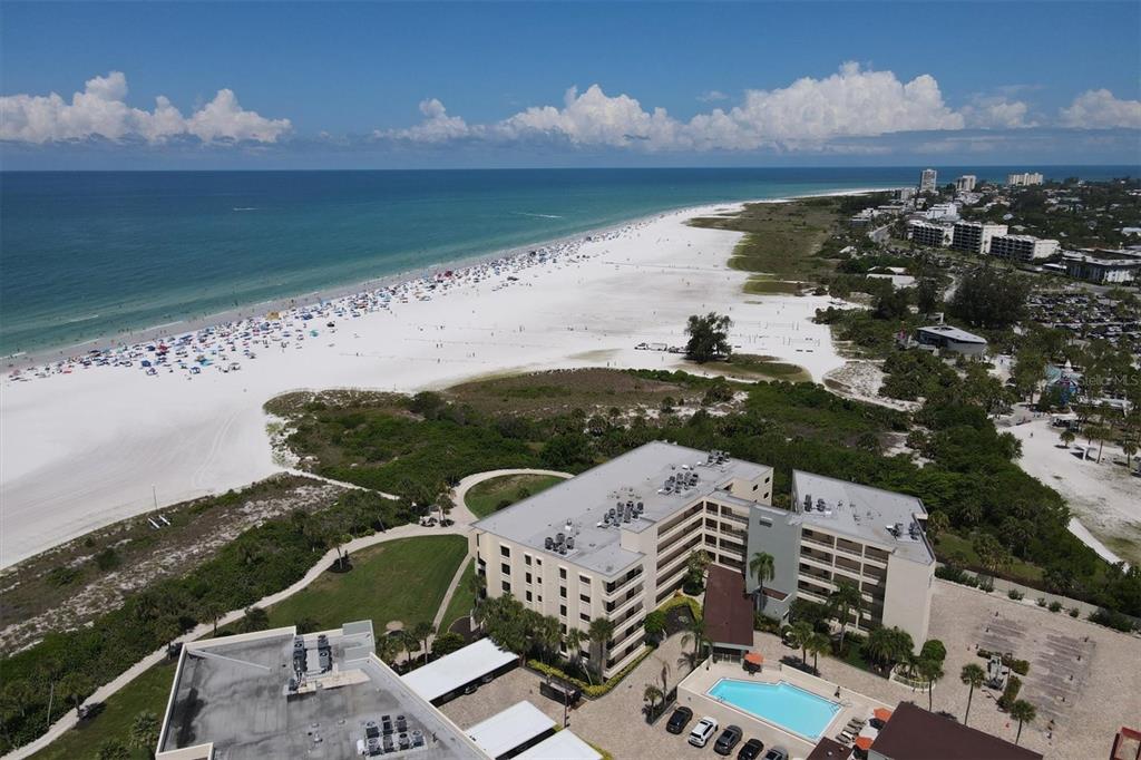 5740 Midnight Pass Road, Unit 303F Sarasota, FL 34242 - Photo 4 of 51 a view of a balcony with an outdoor space