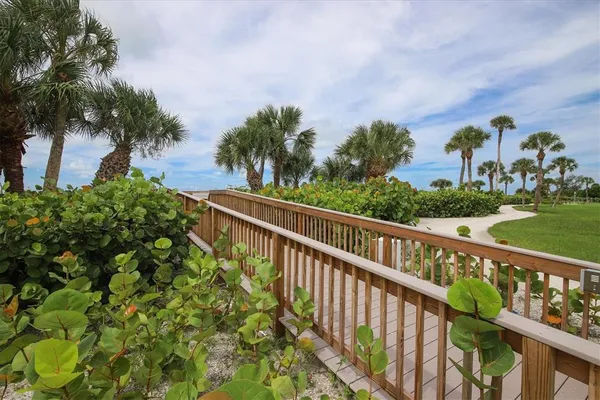 a view of balcony and yard