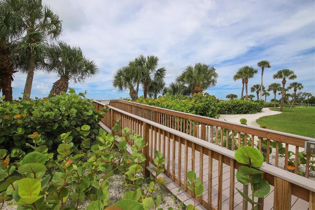 5740 Midnight Pass Road, Unit 303F Sarasota, FL 34242 - Photo 47 of 51 a balcony with outdoor space