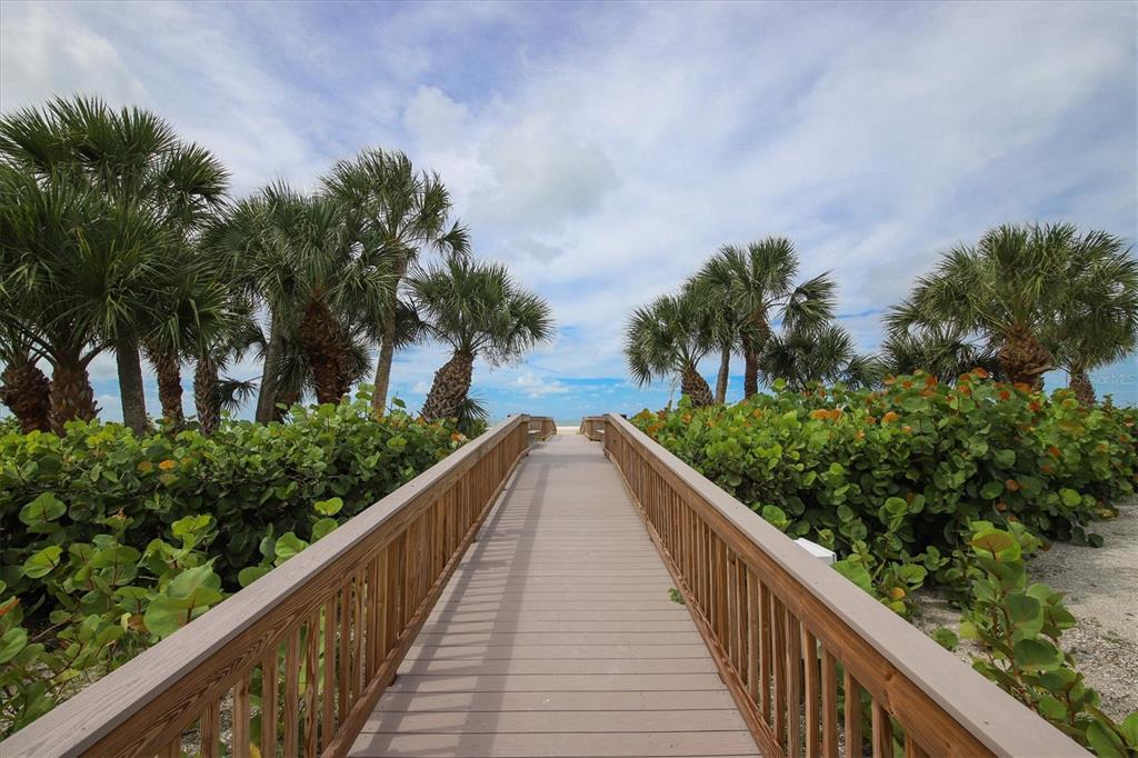 5740 Midnight Pass Road, Unit 303F Sarasota, FL 34242 - Photo 48 of 51 a view of balcony and yard