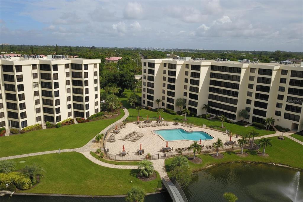 5740 Midnight Pass Road, Unit 303F Sarasota, FL 34242 - Photo 50 of 51 a view of a city with tall buildings