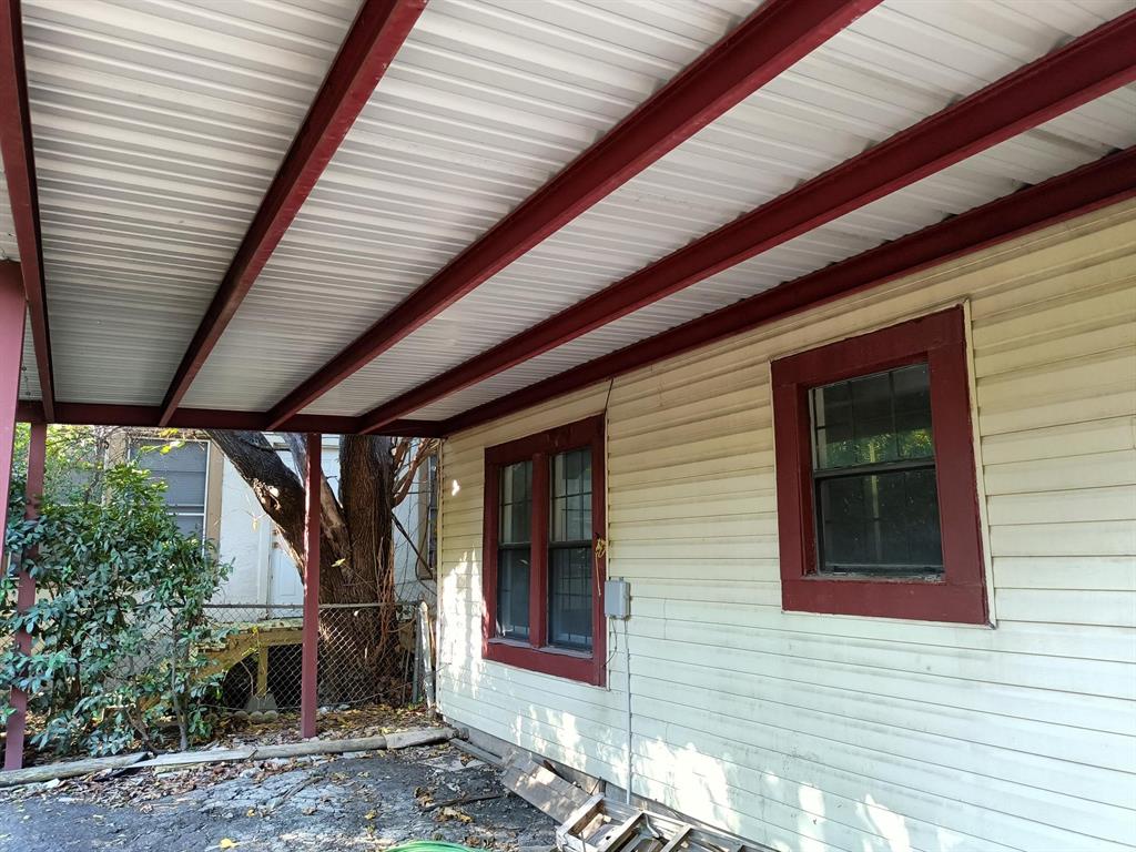 3213 8th Avenue Fort Worth, TX 76110 - Photo 12 of 15 View of property exterior featuring covered porch