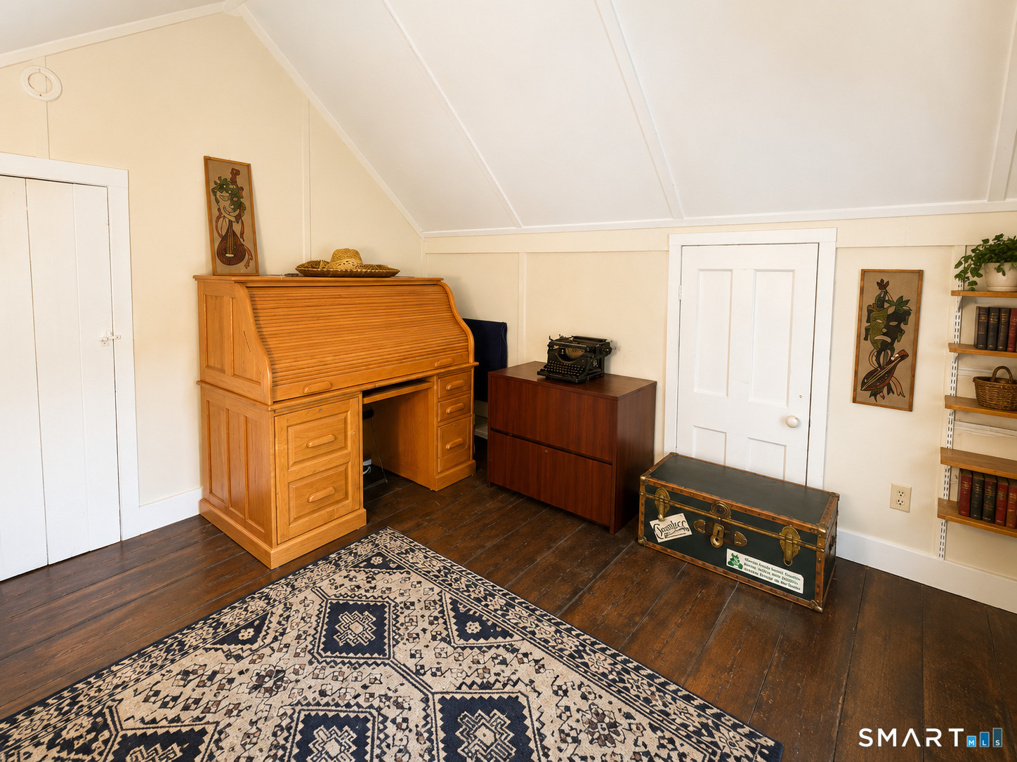 443 Amity Road Bethany, CT 06524 - Photo 29 of 30 a living room with hard wood flooring and a couch