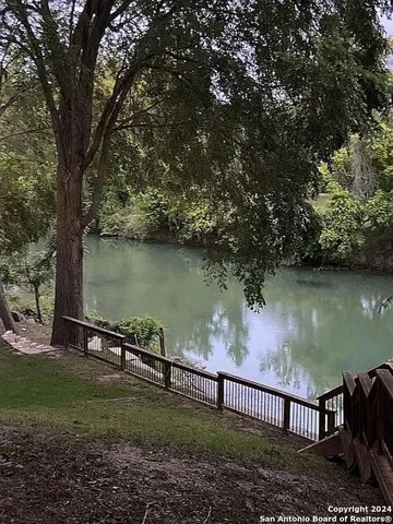 a view of a lake from a balcony