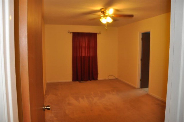 202 Delone Road Byron, GA 31008 - Photo 17 of 20 a view of empty room with a ceiling fan