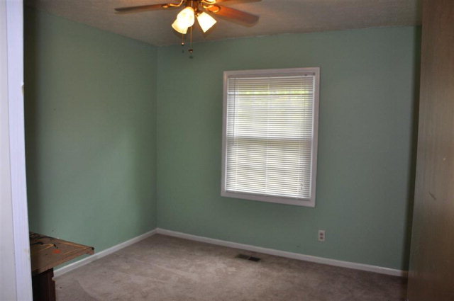 202 Delone Road Byron, GA 31008 - Photo 9 of 20 an empty room with a window