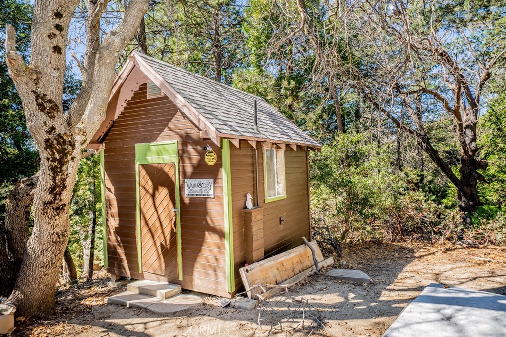 52647 Pine Cove Road Idyllwild, CA 92549 - Photo 24 of 35 a view of a house with a tree