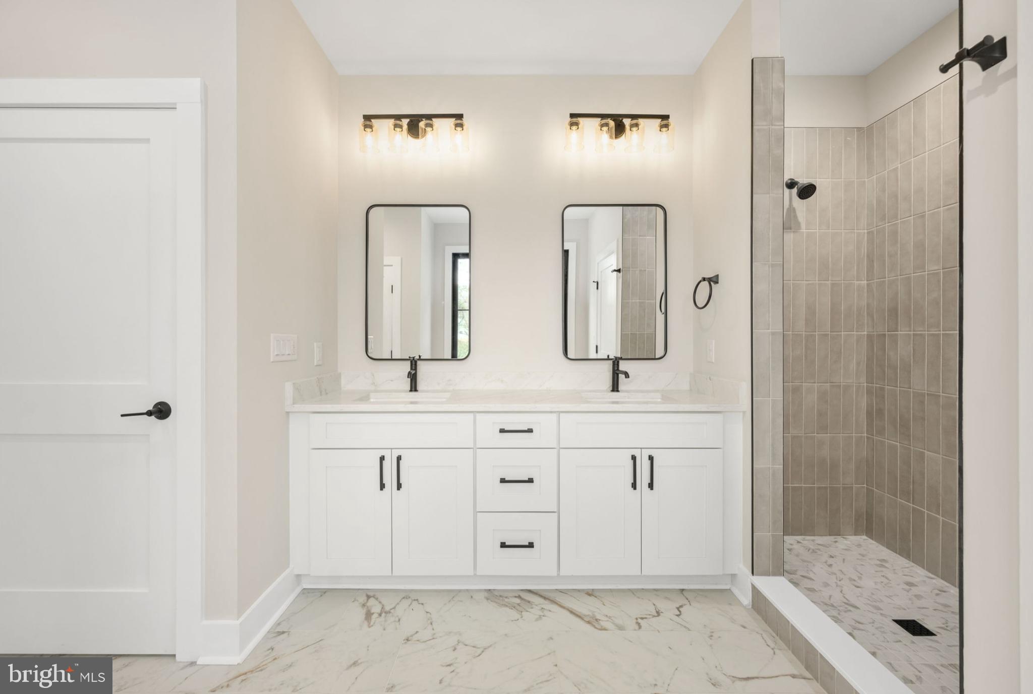 75 Sleepy Hollow Road Linden, VA 22642 - Photo 6 of 19 a bathroom with double vanity sink and mirror