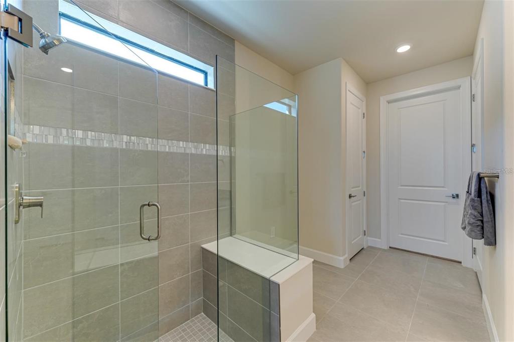 18023 Waterville Place Lakewood Ranch, FL 34202 - Photo 24 of 41 a bathroom with a shower and a sink