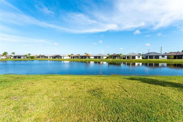 a view of a lake with houses