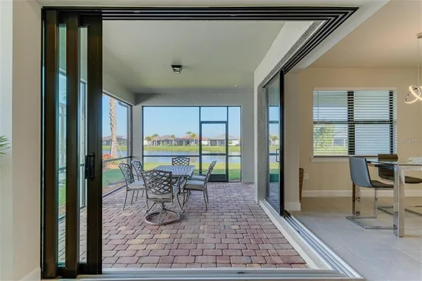a view of a patio with furniture and window