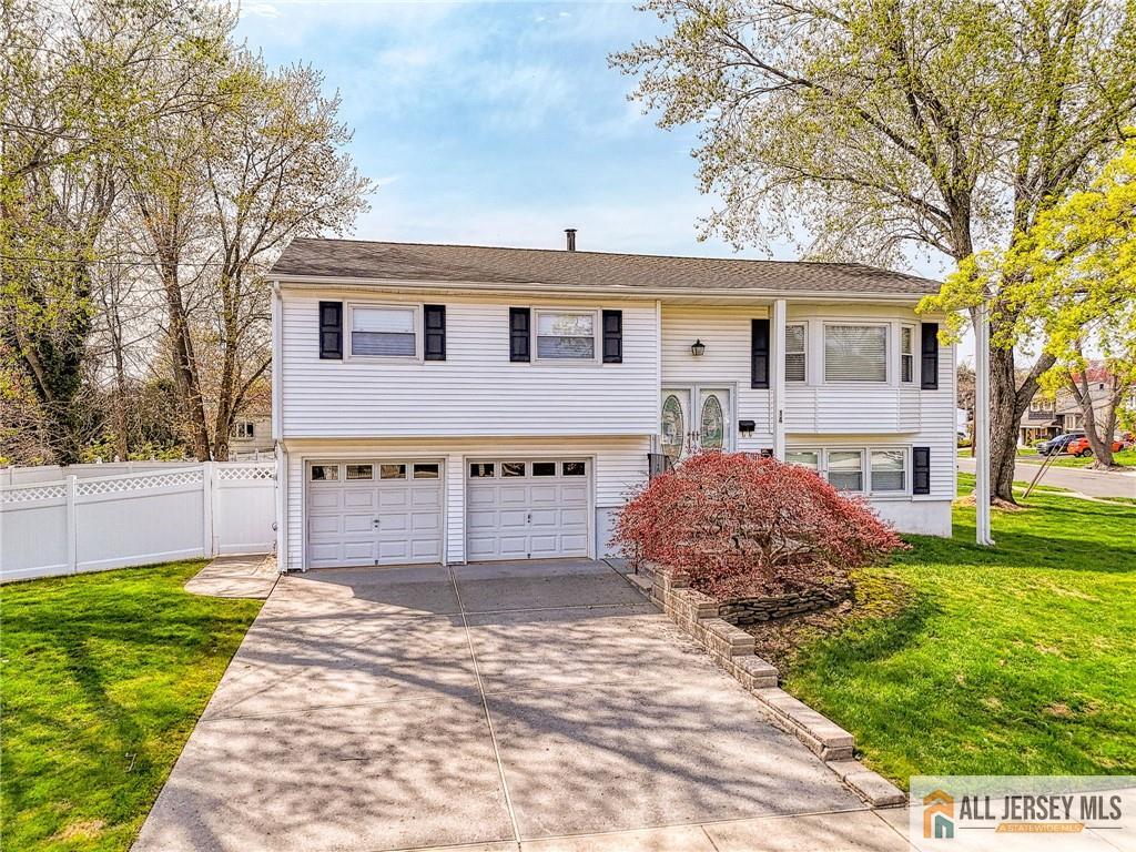 14 Gramercy Road Old Bridge, NJ 08857 - Photo 1 of 26 a view of a house with a yard and large tree