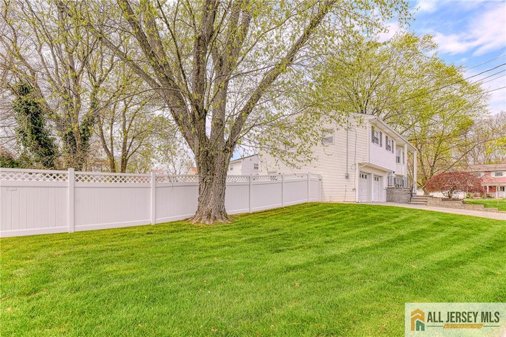 14 Gramercy Road Old Bridge, NJ 08857 - Photo 20 of 26 a view of backyard with large trees