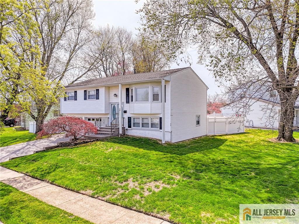 14 Gramercy Road Old Bridge, NJ 08857 - Photo 2 of 26 a view of a house with a yard and trees