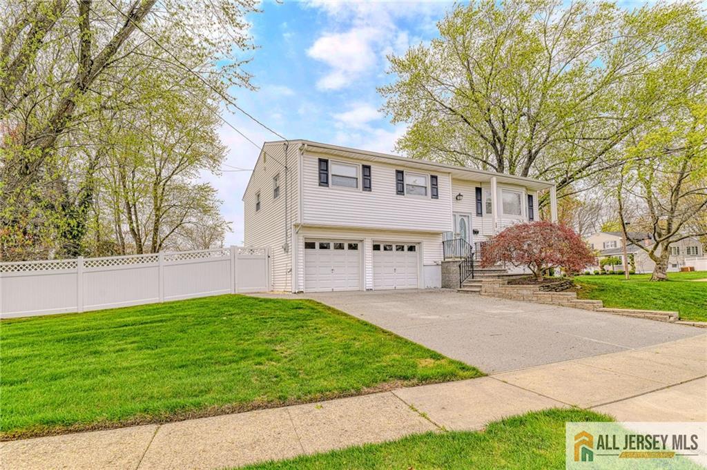 14 Gramercy Road Old Bridge, NJ 08857 - Photo 26 of 26 a front view of house with yard and trees around