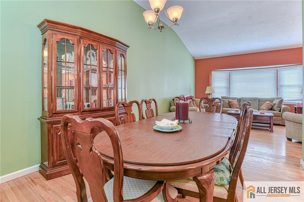 14 Gramercy Road Old Bridge, NJ 08857 - Photo 6 of 26 a view of a dining room with furniture