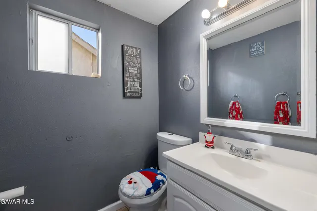 a bathroom with a sink and a toilet