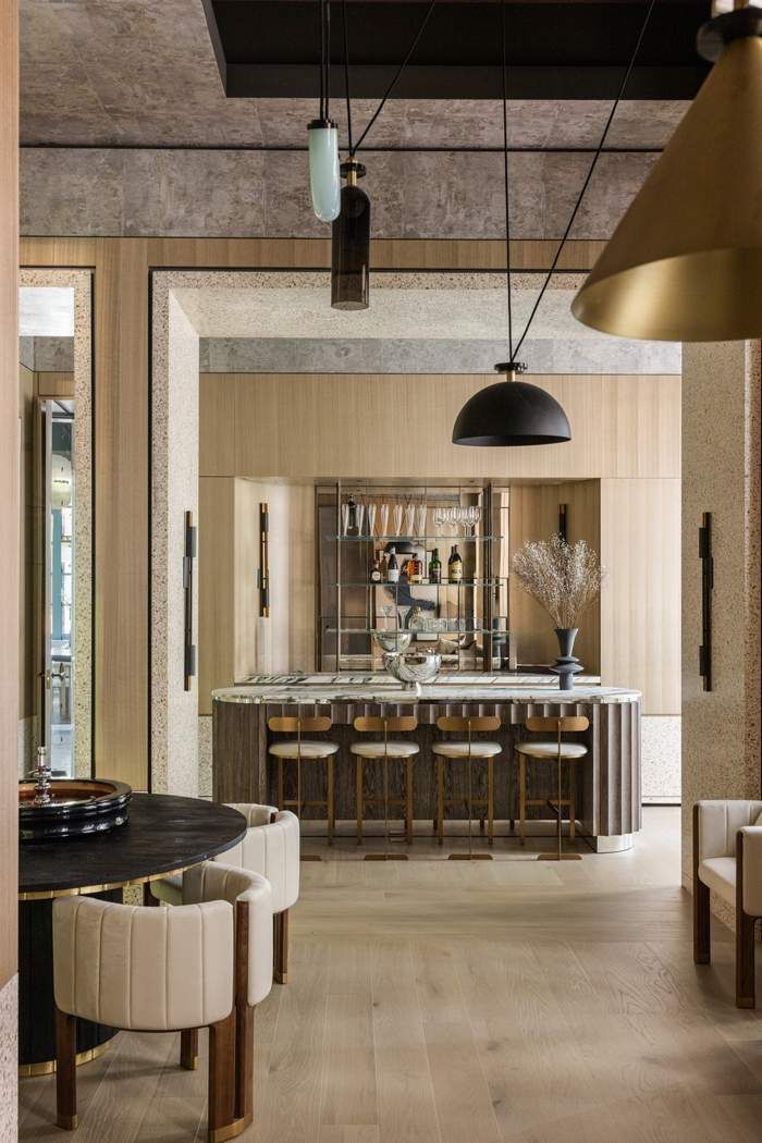 50 Central Park West, Unit MAIS-DUPLEX Manhattan, NY 10023 - Photo 10 of 36 a kitchen with a table and chairs in it