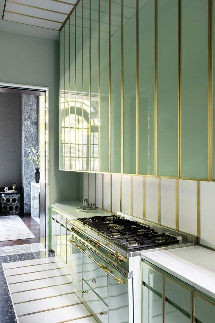 50 Central Park West, Unit MAIS-DUPLEX Manhattan, NY 10023 - Photo 14 of 36 a kitchen with stainless steel appliances granite countertop a stove a sink and a microwave