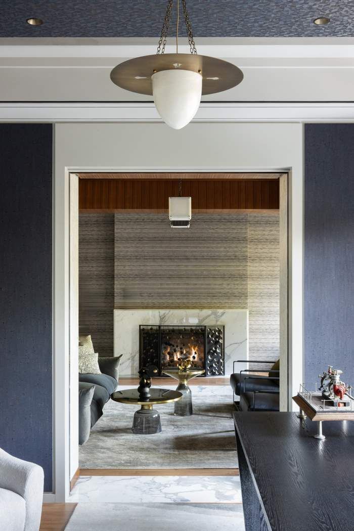 50 Central Park West, Unit MAIS-DUPLEX Manhattan, NY 10023 - Photo 23 of 36 a living room with furniture and a fireplace