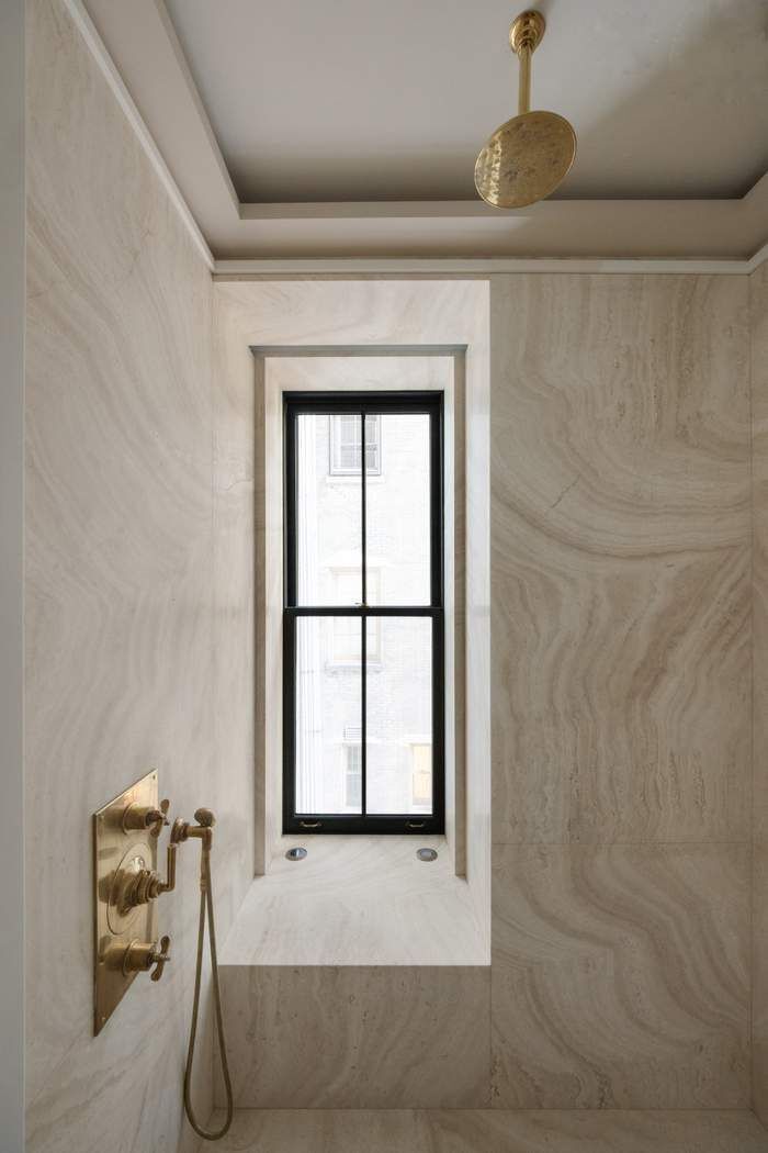 50 Central Park West, Unit MAIS-DUPLEX Manhattan, NY 10023 - Photo 28 of 36 a bathroom with a window and a bathtub