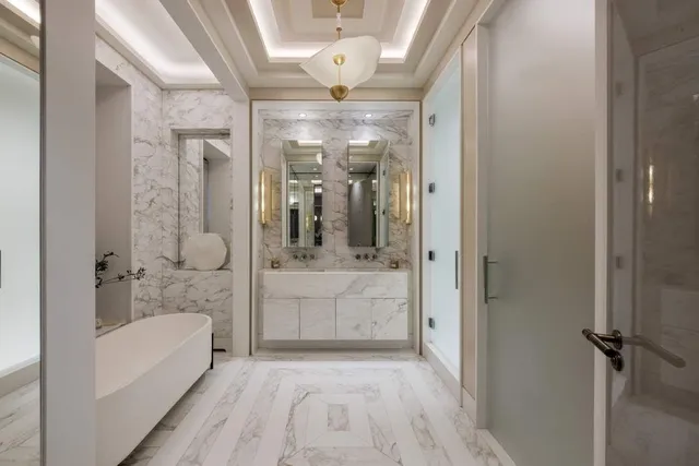 a bed room with a bed and a window