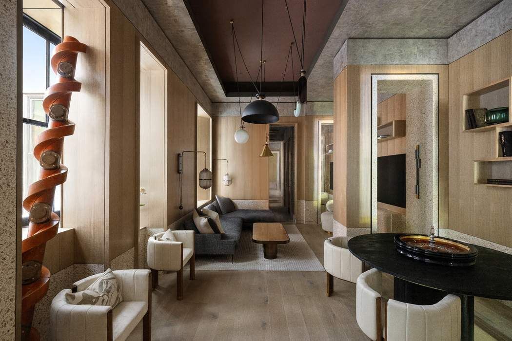 50 Central Park West, Unit MAIS-DUPLEX Manhattan, NY 10023 - Photo 9 of 36 a living room with furniture and a flat screen tv