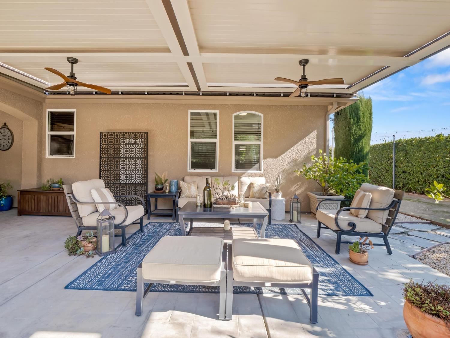2750 Muncie Avenue Clovis, CA 93619 - Photo 31 of 51 a outdoor space with patio the couches and a dining table with chairs