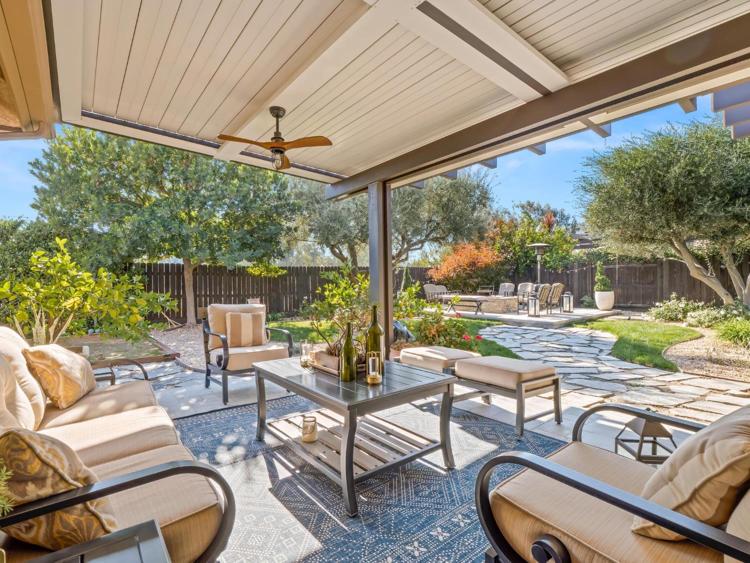 2750 Muncie Avenue Clovis, CA 93619 - Photo 42 of 51 a view of a patio with couches chairs and a potted plant
