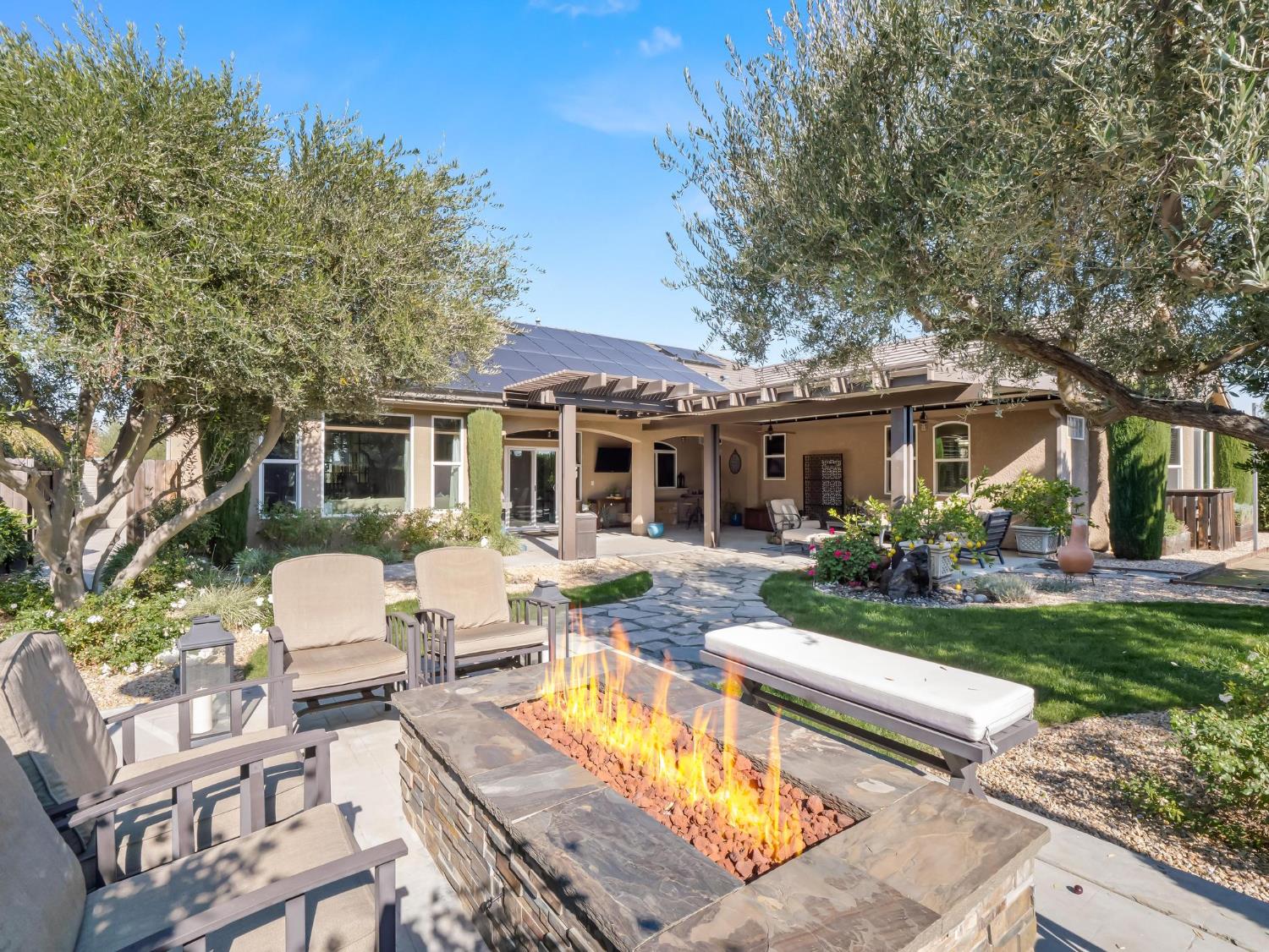 2750 Muncie Avenue Clovis, CA 93619 - Photo 45 of 51 a view of a house with backyard and sitting area
