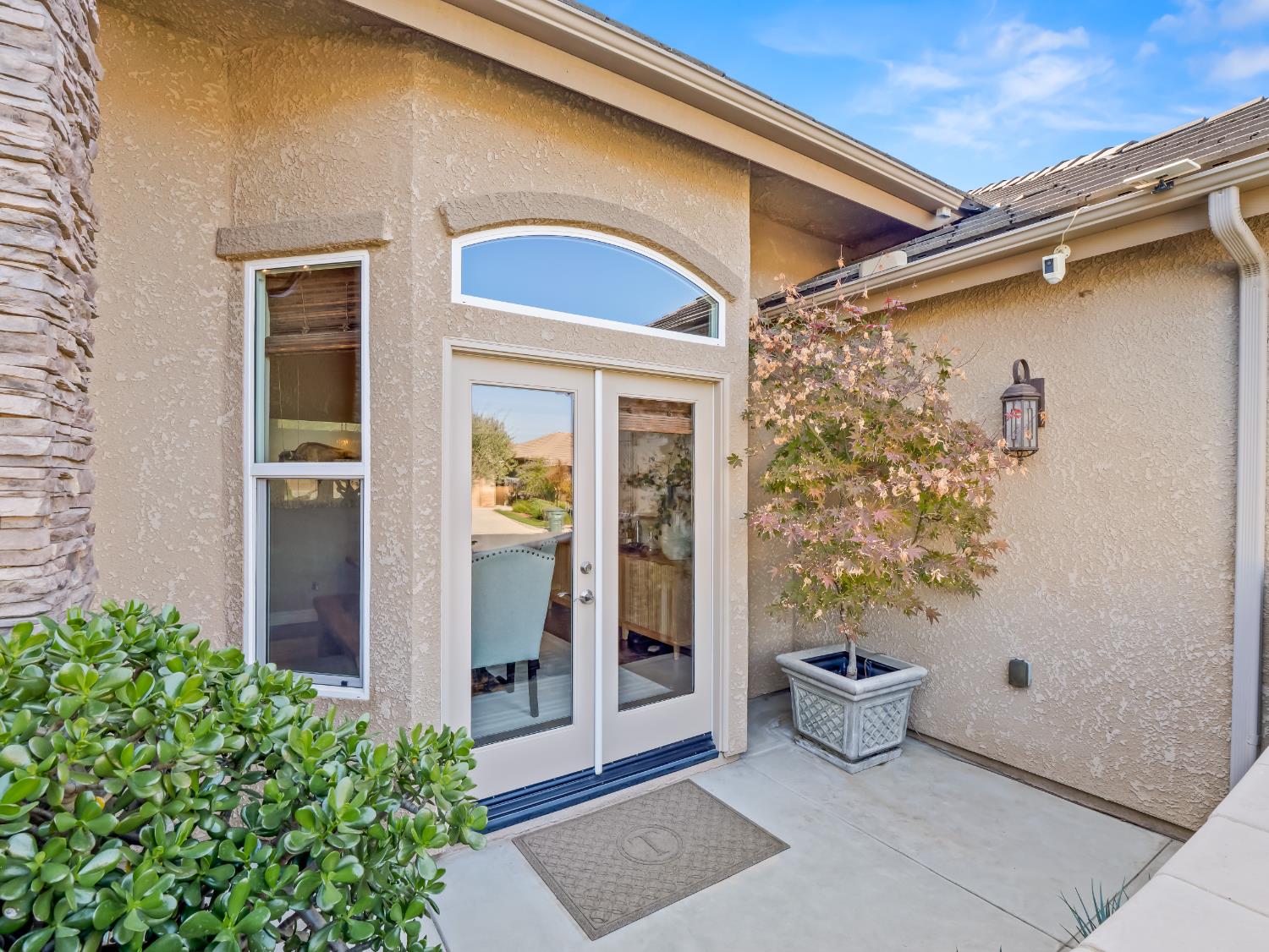 2750 Muncie Avenue Clovis, CA 93619 - Photo 6 of 51 a front view of a house with outdoor seating and shower