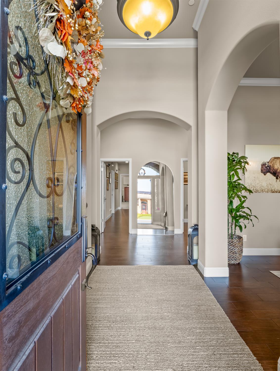 2750 Muncie Avenue Clovis, CA 93619 - Photo 8 of 51 a view of a living room and a potted plant
