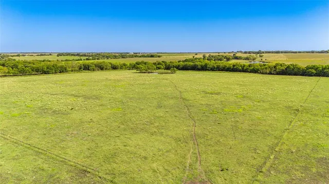 a view of an ocean from a city