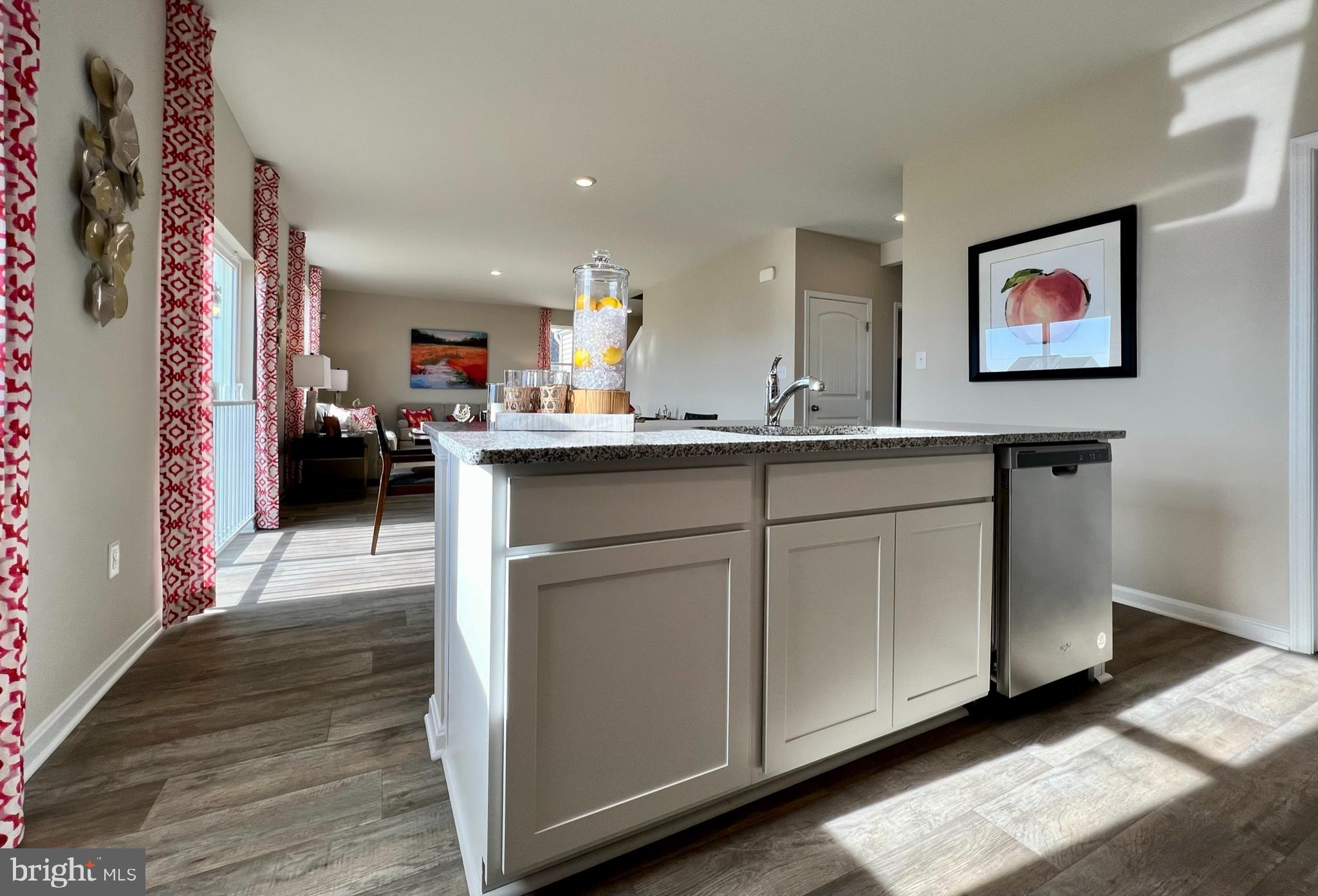 11 Buttercup Circle Elkton, MD 21921 - Photo 15 of 36 a kitchen with stainless steel appliances granite countertop a stove a sink and a refrigerator