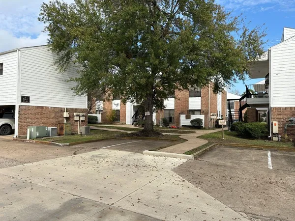 a view of a house with swimming pool