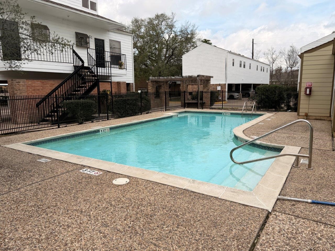 7901 Cambridge Street, Unit 104 Houston, TX 77054 - Photo 12 of 15 a view of a house with swimming pool