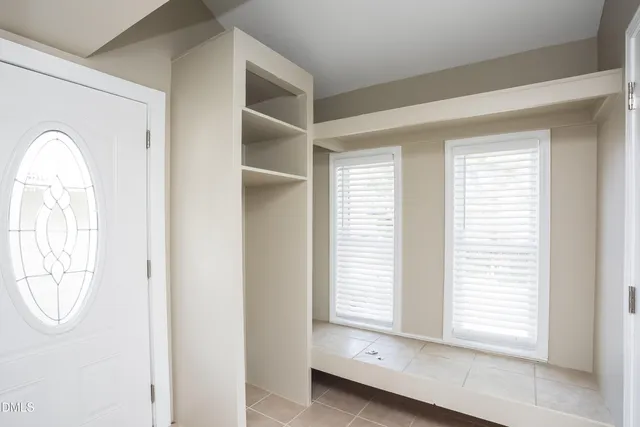 a view of a room that has a large window