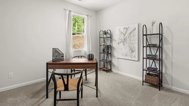 a view of a livingroom with furniture