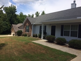 3381 Trotters Ridge Trail Gray, GA 31032 - Photo 1 of 15 a front view of a house with a yard and potted plants