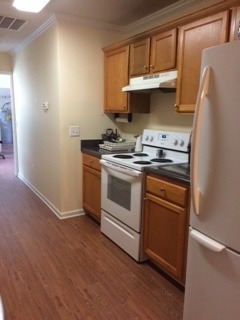 3381 Trotters Ridge Trail Gray, GA 31032 - Photo 5 of 15 a kitchen with stainless steel appliances granite countertop a stove and a refrigerator
